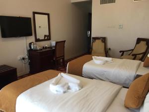 Letto o letti in una camera di Diwan Al Amir