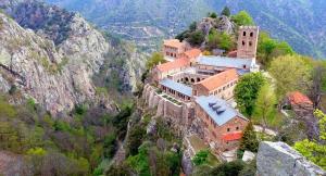 a building on the side of a mountain at Chez Vivi in Ria