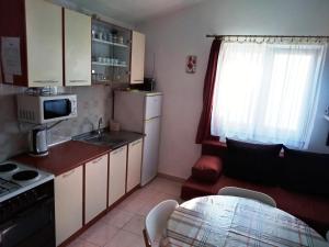 Kuchyň nebo kuchyňský kout v ubytování Apartment More OTOK Žirje