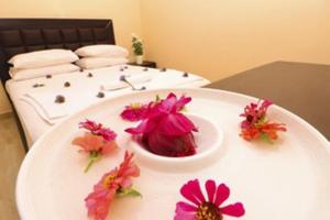 Voodi või voodid majutusasutuse Peacock Resort toas
