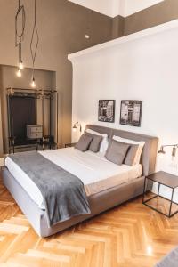 A bed or beds in a room at Relais Della Porta