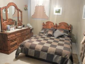 Un ou plusieurs lits dans un hébergement de l'établissement Domaine Joseph Ross Bed and Breakfast