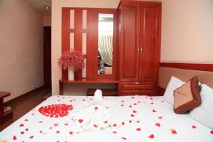 Postel nebo postele na pokoji v ubytování Paradis Hotel
