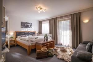 Postel nebo postele na pokoji v ubytování Landhaus Dengg