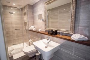 Vonios kambarys apgyvendinimo įstaigoje Trinity Townhouse Hotel