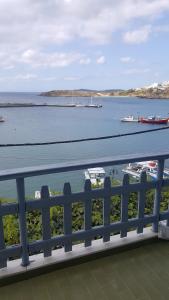 a view of a harbor with boats in the water at Esperides Sea in Andros