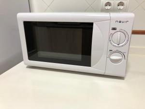 Kuchyň nebo kuchyňský kout v ubytování Apartamento Asuncion