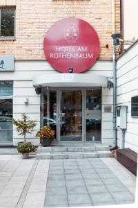 un bâtiment avec un panneau indiquant l'hôtel am rotelandiane dans l'établissement Hotel am Rothenbaum, à Hambourg