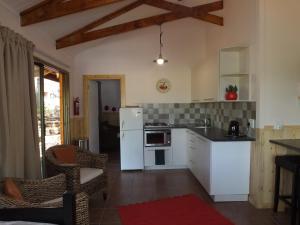 A kitchen or kitchenette at Tatenda Guest House