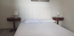 Postel nebo postele na pokoji v ubytování Apartments Villa Plava