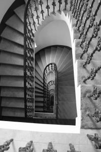 a view of a spiral staircase in a building at Hotel Trevi in Prague