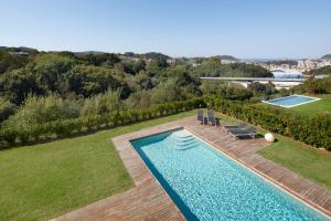 an aerial view of a swimming pool in a garden at Villa Enea by FeelFree Rentals in San Sebastián