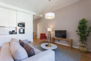 TV a/nebo společenská místnost v ubytování FLH Restauradores Charming Apartment