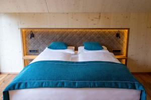 Ein Bett oder Betten in einem Zimmer der Unterkunft Haus Christophorus