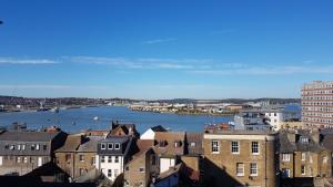 a view of a city with a river and buildings at Spacious Apartment Sleeps 6 in Rochester