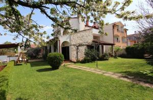 Κήπος έξω από το Apartments Milena