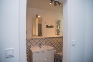 A bathroom at Rába Apartman House