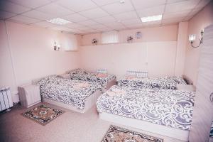 Krevet ili kreveti u jedinici u objektu Na naberezhnoy Guesthouse
