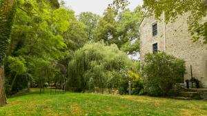 Zahrada ubytování Le Moulin de Pommeuse