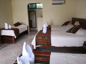 Postel nebo postele na pokoji v ubytování Arena Blanca Eco Hotel