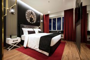 Postel nebo postele na pokoji v ubytování Maxime Boutique Hotel Avenida da Liberdade