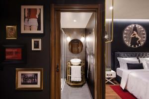 Postel nebo postele na pokoji v ubytování Maxime Boutique Hotel Avenida da Liberdade