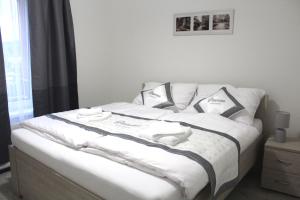 Posteľ alebo postele v izbe v ubytovaní Panorama Apartments