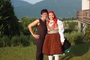 a woman in a dress standing next to a man at Ferienwohnung Andritsch in Sankt Georgen im Gailtal