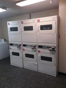 four ovens stacked on top of each other in a room at InTown Suites Extended Stay Nashville TN - Murfreesboro Pike in Antioch