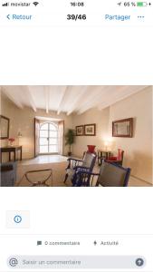 a living room with chairs and a table at Font Fresca House in Deia