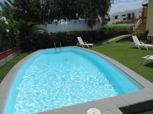 Bazén v ubytování New Miami Playa Apartamentos nebo v jeho okolí