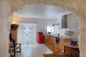 Kuchyň nebo kuchyňský kout v ubytování Apartamento Palau Cadaques