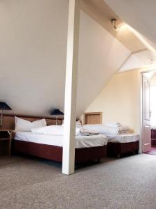 Кровать или кровати в номере Boutique Hotel Villa Stockum