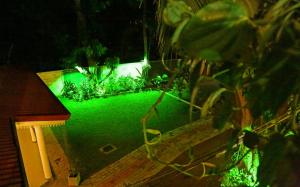 an aerial view of a garden at night at Vishmee Holiday Inn in Embilipitiya