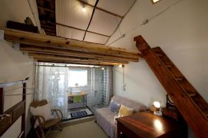 Posezení v ubytování 香蕉與黑膠 Yellow And Black Guest House + 37 fotografií