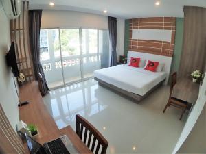 Katil atau katil-katil dalam bilik di Pop-In Aonang