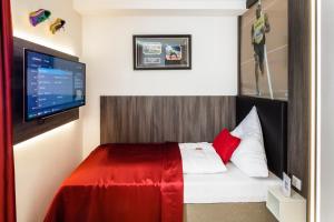 Cama ou camas em um quarto em Star Apart Hotel Sachsenhausen