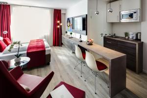 A cozinha ou cozinha compacta de Star Apart Hotel Sachsenhausen