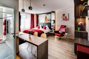 Uma área de estar em Star Apart Hotel Sachsenhausen