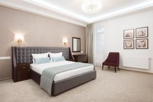 Postel nebo postele na pokoji v ubytování Roxen Hotel&Spa + 37 fotografií
