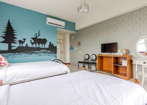 月光莊園民宿 房間的床 +12 張相片