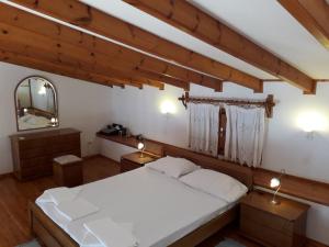 Postel nebo postele na pokoji v ubytování Sirius House