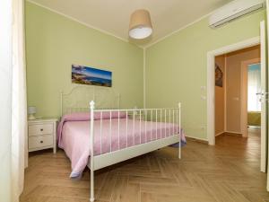Postel nebo postele na pokoji v ubytování Appartamento La Carnale