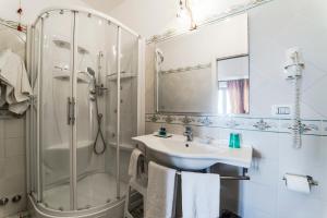 Koupelna v ubytování Hotel Villa Sirio