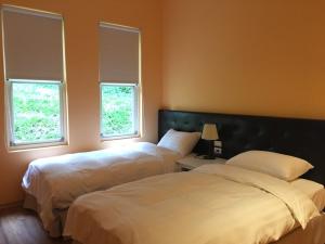 Letto o letti in una camera di American Village Resort