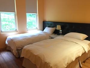 Letto o letti in una camera di American Village Resort