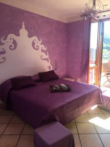 A bed or beds in a room at Villa Fernanda