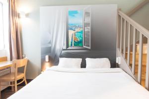Ein Bett oder Betten in einem Zimmer der Unterkunft B&B HOTEL Saint-Malo Centre