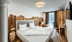 Postel nebo postele na pokoji v ubytování Hotel Schmung