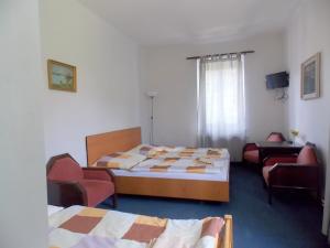 Postel nebo postele na pokoji v ubytování Hotel Britz